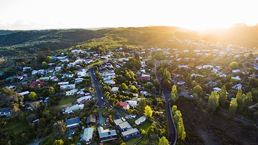 A bird's eye view of a suburb of residential housing in NZ.