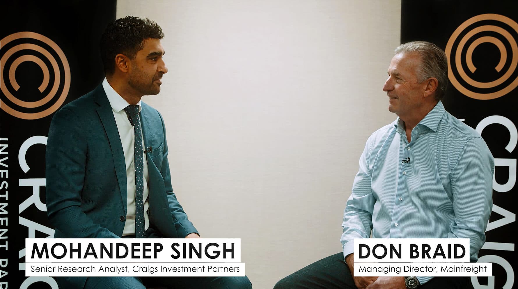 A wide shot of Mohandeep Singh interviewing Don Braid.