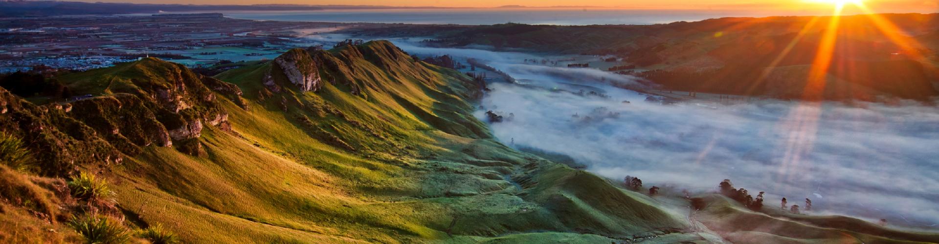 A high angle shot of a foggy sunrise in Havelock North.